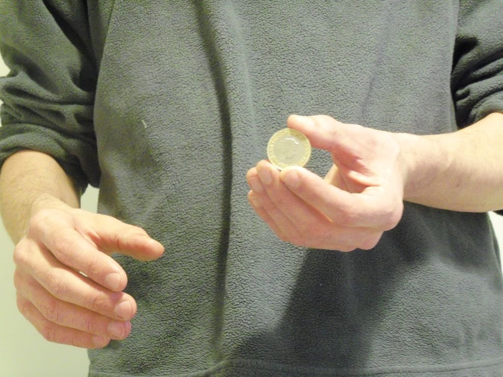 magic trick with coin revealed