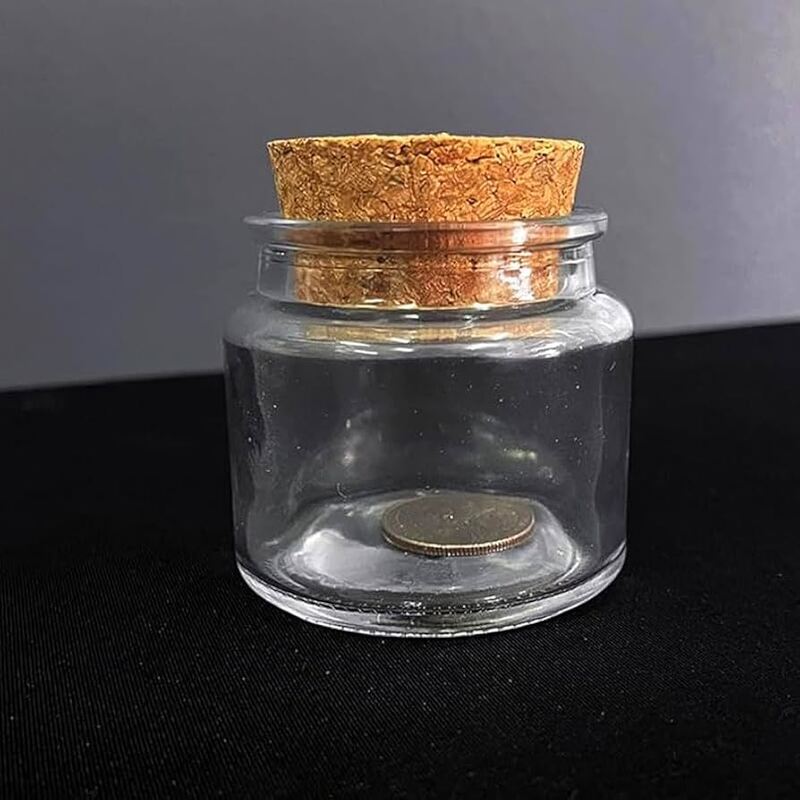 trick coin in glass bottle